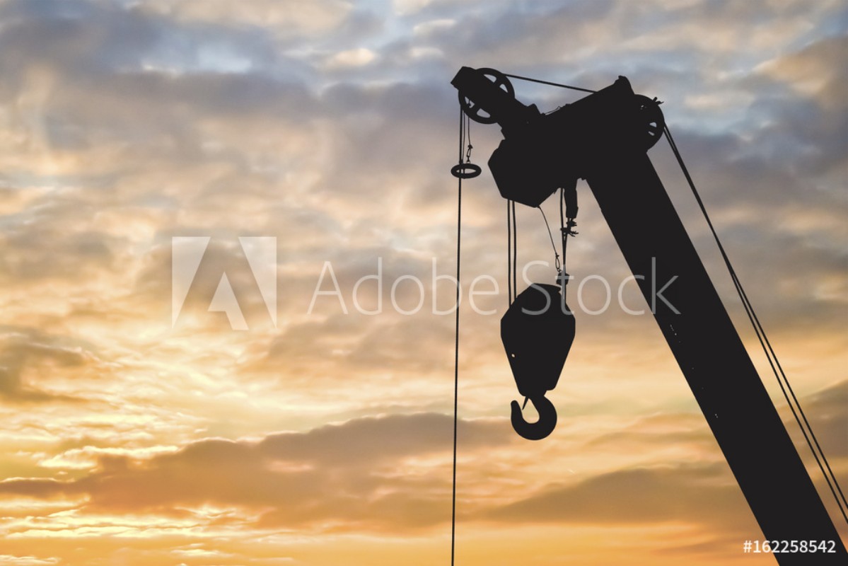 Bild på Silhouette construction crane